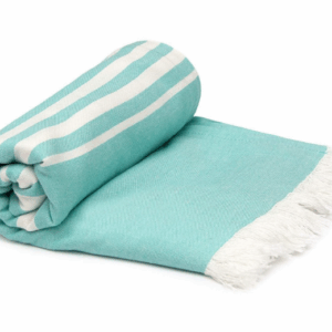 Ultra-soft and lightweight, this blue bath towel from Mush is crafted from 100% bamboo-derived rayon for superior absorbency—absorbing three times more water than cotton.