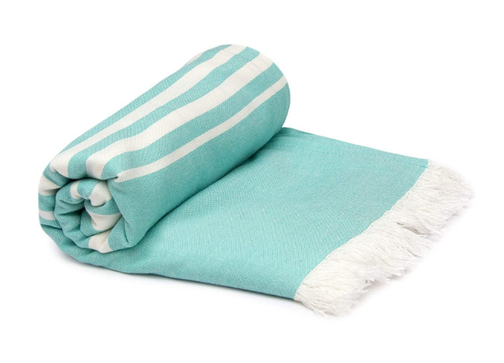 Ultra-soft and lightweight, this blue bath towel from Mush is crafted from 100% bamboo-derived rayon for superior absorbency—absorbing three times more water than cotton.