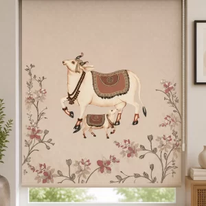 Traditional beige PVC roller blind featuring an Indian folk art cow and calf design with floral accents installed on a modern window